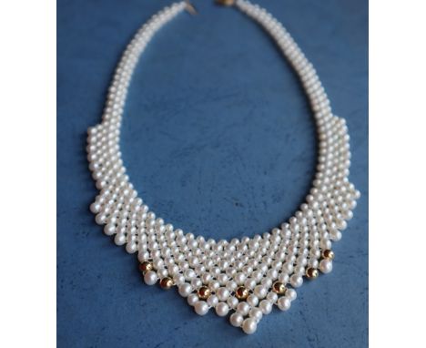 A pearl and 14ct yellow gold choker, of fringe stepped form to a 14ct gold clasp, 42.5cm long