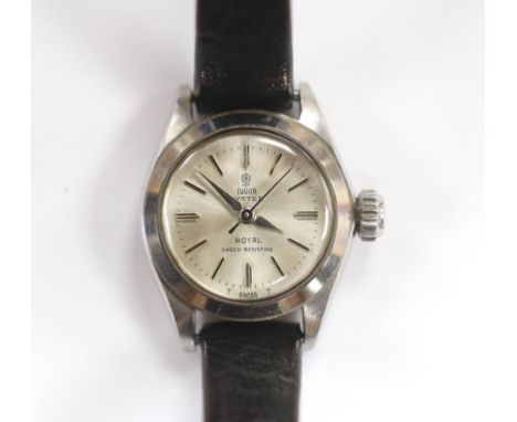 A lady's stainless steel Tudor Oyster Royal manual wind wrist watch, on an associated black leather strap, with Tudor box and