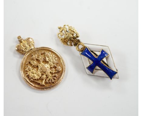 A Russian gilt white metal and enamel graduation from University of St Petersburg badge, 33mm and a yellow metal (tests as 14