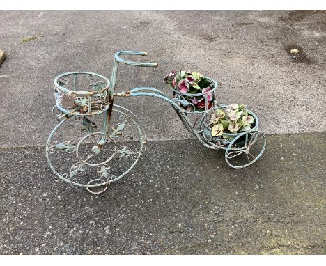 A painted metal bicycle plant stand, length 90cm