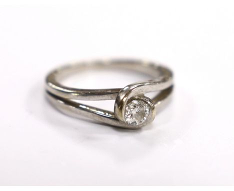 A 9ct white gold and solitaire stone diamond set ring, the stone weighing approx. 0.15cts, size L/M, gross weight 3.4 grams.