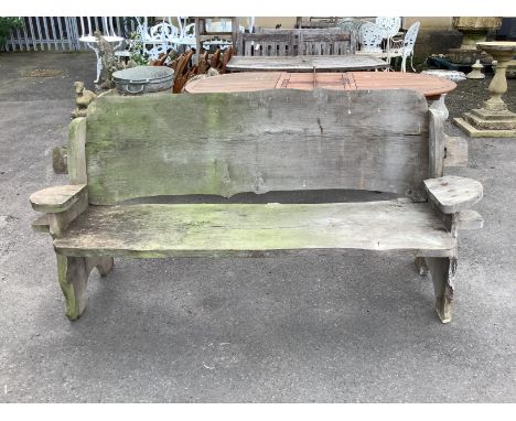 A rustic elm garden bench, width 195cm, depth 62cm, height 92cm Weight unknown