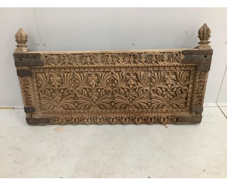 An Indian carved hardwood panel (probably a bench or bed section), width 112cm, height 61cm
