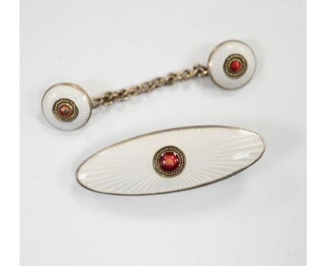 An early 20th century Russian 84 zolotnik and two colour enamel tie clip, 33mm and cloak clasp.