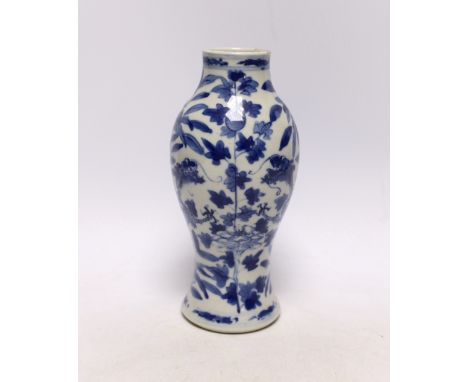 A Chinese blue and white dragon vase, Kangxi mark, late 19th century, 20.5cm high Large chip to upper rim. No other damage fo