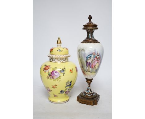 A 19th century French ormolu, enamel and porcelain urn and cover and a Dresden yellow urn and cover, tallest 31cm