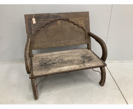 An Indian iron mounted hardwood bench, width 94cm, depth 55cm, height 89cm