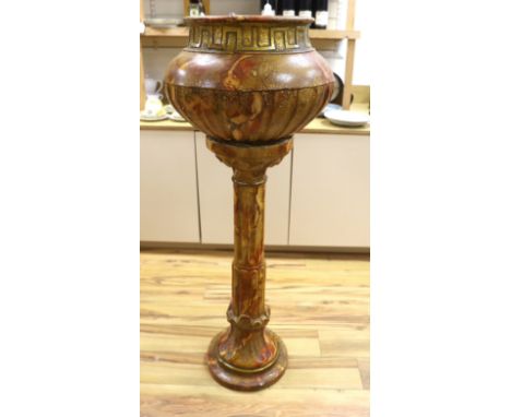 A large faux marble pottery jardiniere on stand, 126cm total height