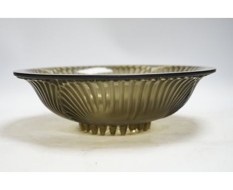An R. Lalique 'Montigny' glass bowl, 30.5cm diameter Many of the 24 serrated feet chipped; bowl interior with some surface we