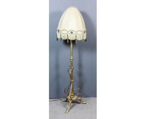 A late Victorian brass standard oil lamp (now converted to electric standard lamp), with turned central column and triple scr
