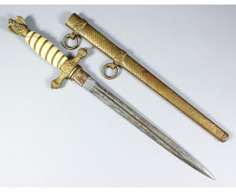 A World War II German Nazi Naval Officer's dress dagger by F. W. Holler, with original brass scabbard, the 9.75ins steel blad