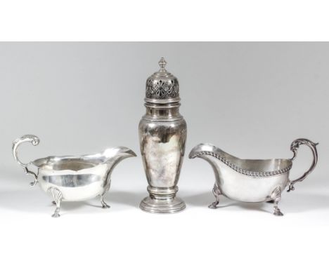 A George VI silver sugar caster, the pierced dome cover with turned finial and tapered body, on circular moulded footrim, 8in