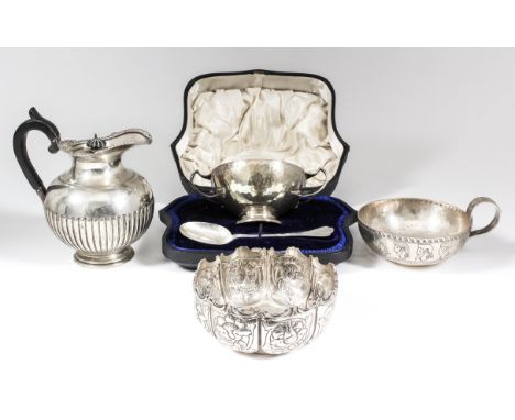 A late Victorian silver spherical lidded jug with gadroon, leaf and shell mounts to shaped rim, part reeded body, ebonised fi