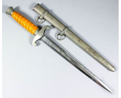 A German World War II Luftwaffe dress dagger, the 10ins double edged bright steel blade etched with maker's mark, "Rich. A. H