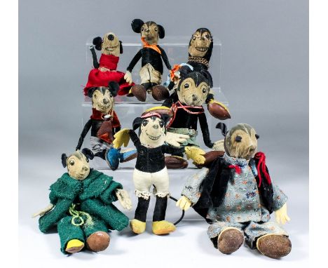 A 1930's Dean's Rag Book black velveteen Minnie Mouse with rare metal button on back, eleven other Dean's Evripose dolls, and