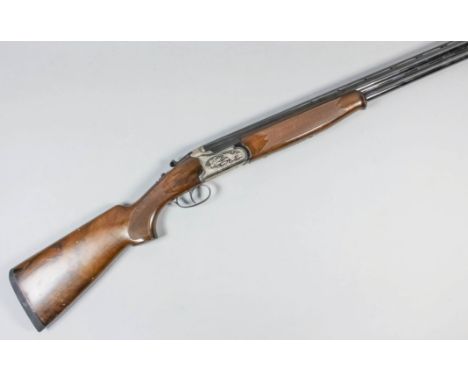 A 12 bore over and under shotgun by Lanber, Serial No. 265169, the 27.5ins blued steel barrels with elevated top rib, bright 