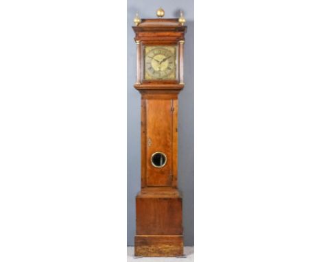 An 18th Century oak longcase clock by John Mercer of Hythe, the 11ins square brass dial with wide brass chapter ring with Rom