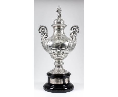 A late Victorian silver two handled prize cup and cover - "The Hornsey and District Chrysanthemum Society" , the cover cast w