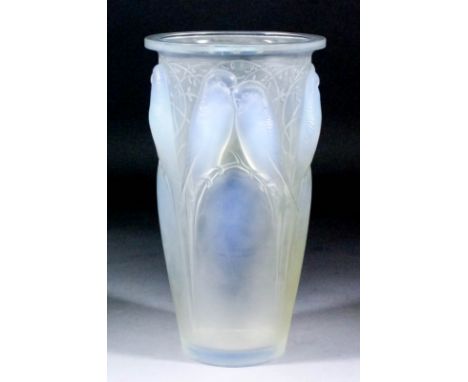 A good Lalique blue opalescent and frosted glass vase of "Ceylan" pattern, No. 905, moulded in bold relief with four pairs of