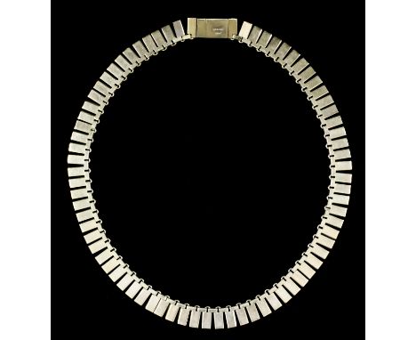 A 9ct gold articulated necklace with engine turned ornament, 400mm overall (gross weight 54.5 grammes)