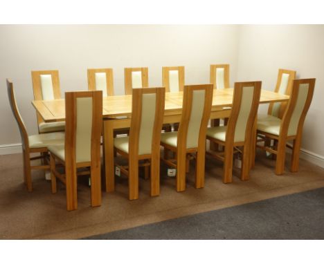 Light oak drawer leaf dining table (90cm x 180cm - 280cm (extended)) and set twelve matching light wood dining chairs   Condi