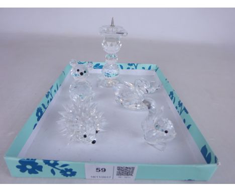 Five Swarovski crystal models; hedgehog, squirrel, bear, swan, a candlestick and one other model (6)   Condition Report   Cli