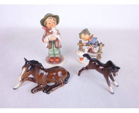 Hummel figure of a boy with lamb and another with a duck and two Beswick foals (4)   Condition Report   Click here for furthe