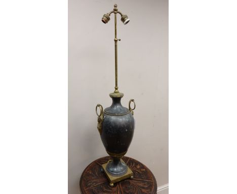 Cast metal urn shaped table lamp with Egyptian style handles   Condition Report   Click here for further images, condition, a