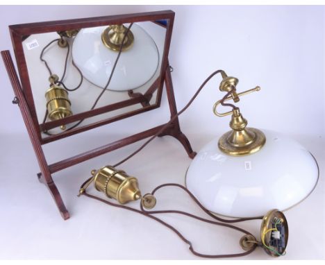 Two Edwardian mahogany dressing table mirrors with fluted frames and a rise and fall ceiling light with brass fittings and op