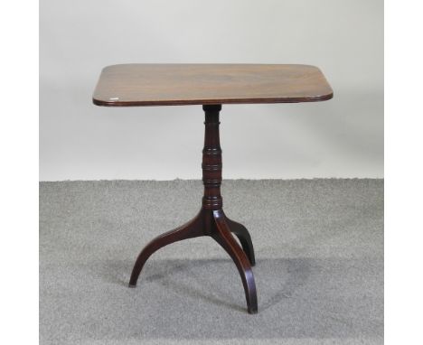 A George III mahogany tilt top occasional table, on a tripod base, 77 x 63cm