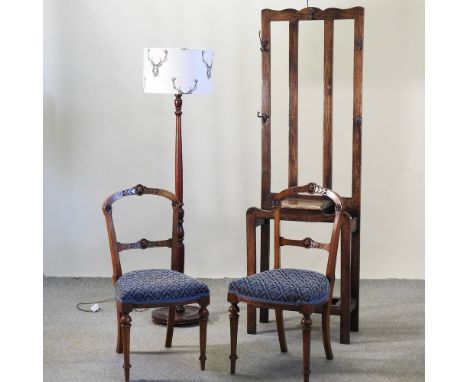 A turned standard lamp and shade, together with a 1920's oak hallstand and a pair of Victorian dining chairs