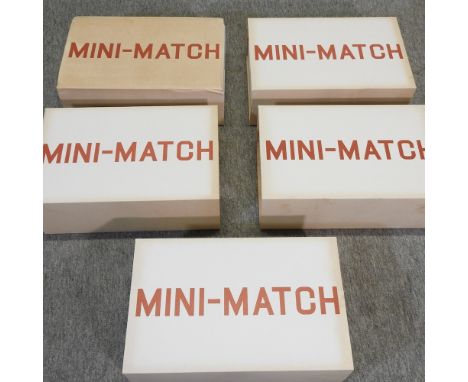 A box of vintage unused Mini Match toy games, boxed