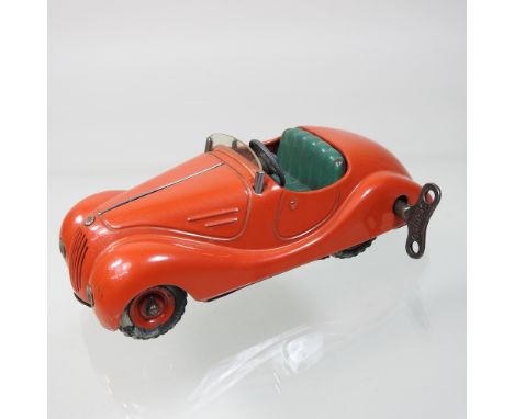 A Schuco Akustico 2002 vintage wind-up toy car, 14cm long
