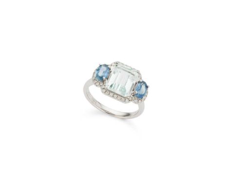 An aquamarine, sapphire and diamond ring claw-set with a rectangular step-cut aquamarine and two oval-cut sapphires, in a bor