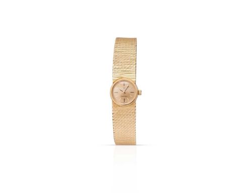 Omega: a bracelet watch 18ct gold case, manual wind movement, 1966 from papers, signed round gold dial with applied baton hou