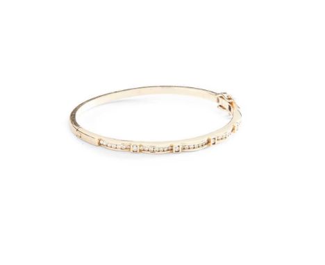 A diamond bangle of hinged design, channel-set with round brilliant-cut diamonds, stamped 9kDimensions:Internal width: 5.8cm