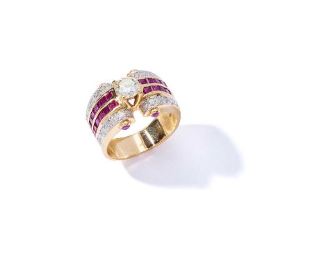 A diamond and ruby dress ring the brilliant-cut diamond between curved shoulders set with twin rows of calibré-cut rubies and