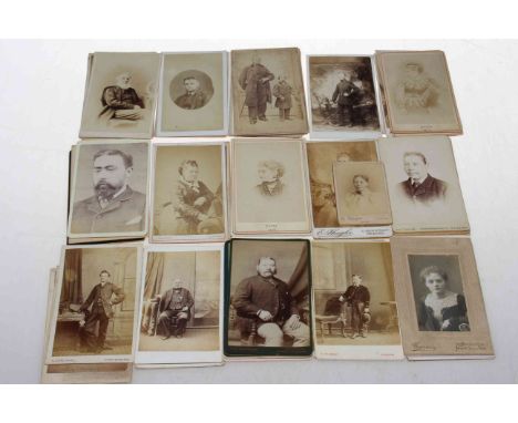 Assorted CDV photographs depicting dogs, Police/Military dressed man, crinoline dresses, giant gentleman, photographers inclu
