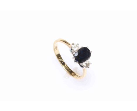 18 carat yellow gold sapphire and diamond ring, size K.