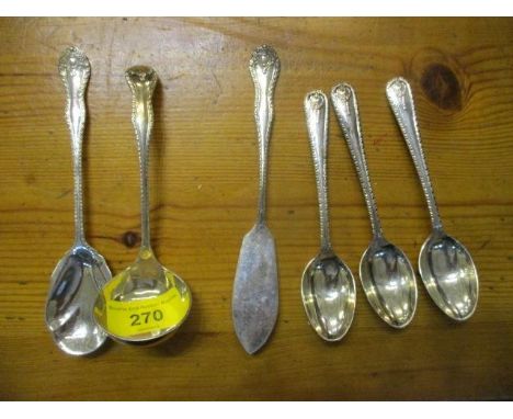 Silver coloured metal to include three matching servers, comprising a sauce ladle, a butter knife and a spoon, along with thr