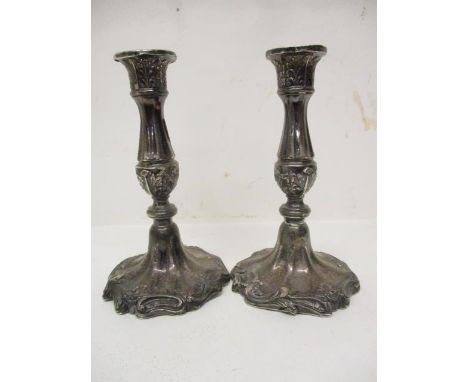 A pair of Victorian silver candlesticks by Henry Wilkinson & Co, Sheffield 1852, with fixed acanthus sconces, knopped and ree