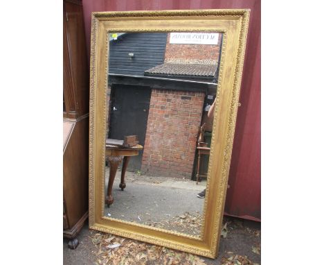 A large Victorian gilt picture frame converted to a mirror, 71 1/2" h x 46"w 