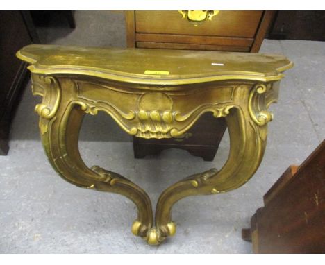 A reproduction gilt wood, carved console table, 25" h x 25 1/2" w 