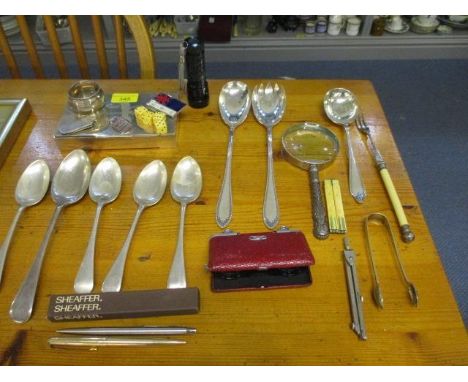 Mixed silver plate, a silver cigarette box, dice, vintage pens to include Sheaffer, opera glasses, badges, a silver napkin ri