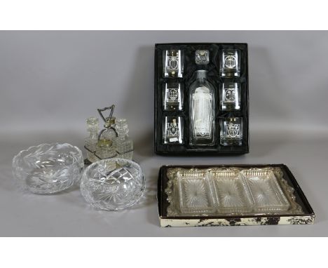 A boxed Rennie Mackintosh style crystal drinking set comprising decanter and six glasses along with a four piece plated condi