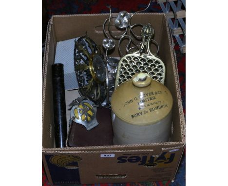 A box of miscellaneous to include brass trivet, vintage AA car grill badge, stoneware advertising flagon, silverplate, cased 