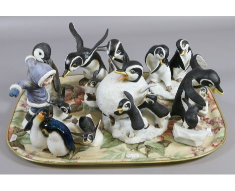 A tray of resin and ceramic penguins to include six Franklin Mint figures and an Aynsley example.