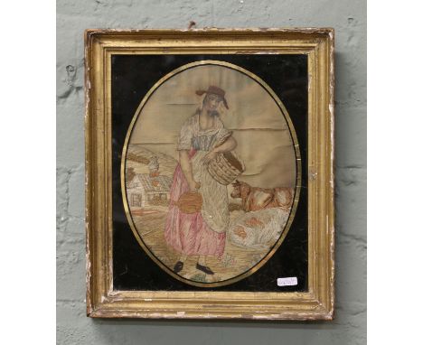 A Regency gilt framed silk and wool work embroidery. Portrait of a milkmaid. 