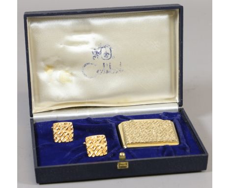 A cased Colibri gilt metal lighter and pair of cufflinks.
