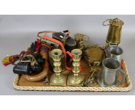 A tray of metalware to include bugle, pair of candlesticks, Eccles protector lamp, pewter tankards etc.
